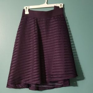 Purple eyelet mini skirt